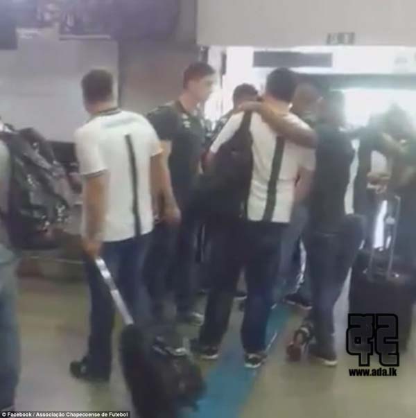 3AD8300A00000578-3980974-Chapecoense_players_embraced_as_they_prepared_to_take_off_from_B-a-28_1480408090635