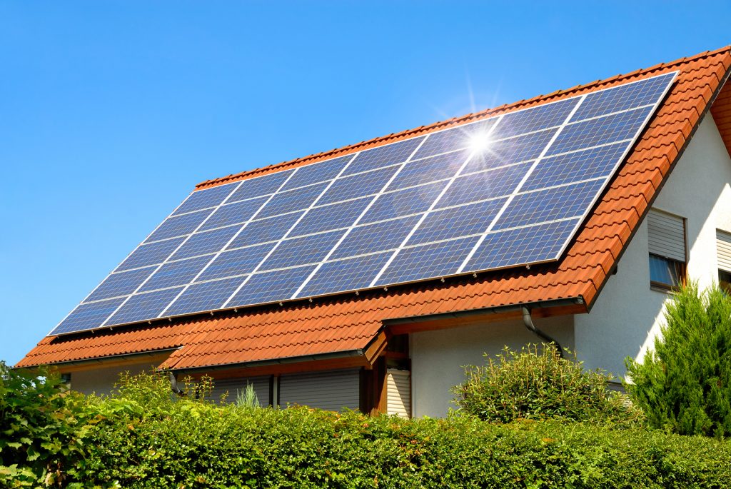 bigstock-Solar-Panel-On-A-Red-Roof-14532428