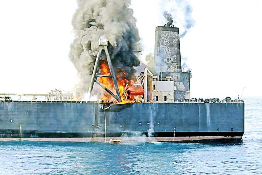 Kilometre-long slick left by burning oil tanker off Sri Lanka