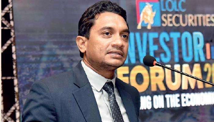 Deputy Minister urges firms to tap stock market, pledges macro stability and reforms