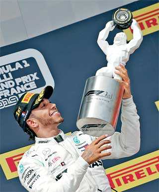 Hamilton dominates in France on a dull day for F1