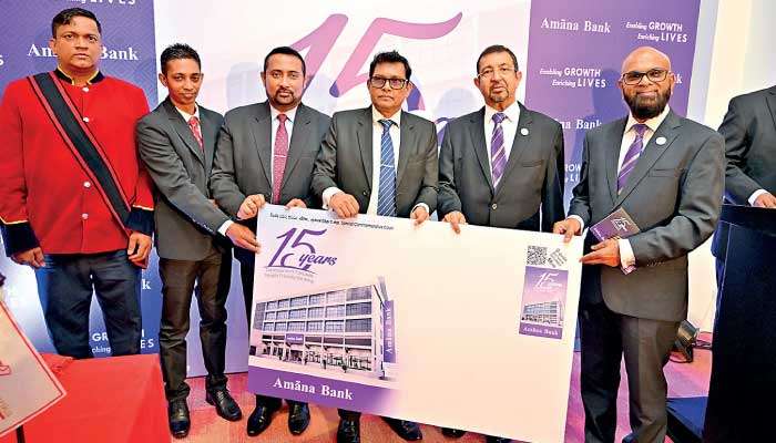 Amãna Bank marks 15 years with commemorative cover and stamp