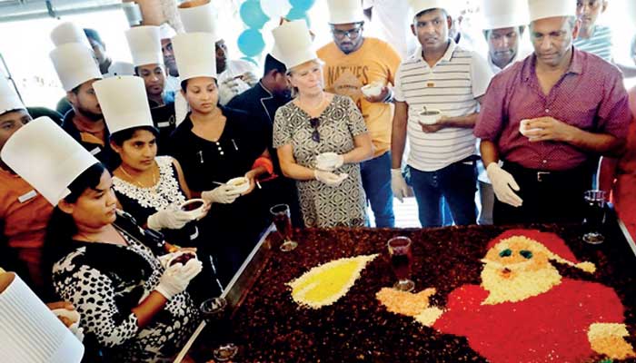 Udupi: Manipal Inn Hotel, Convention centre begins Christmas celebrations  with cake mixing ceremony - Daijiworld.com