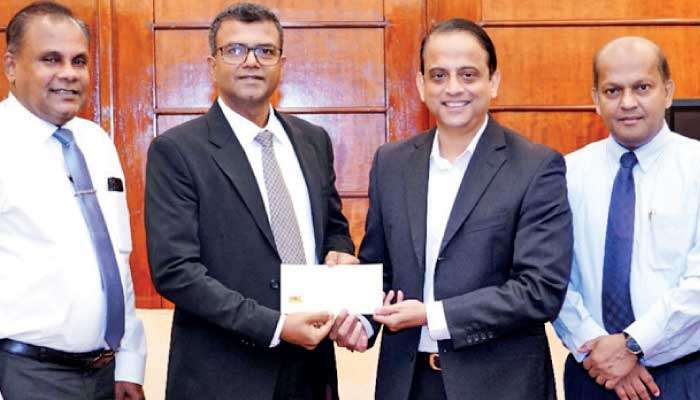 BOC hands over Rs. 5 b  dividend to Treasury