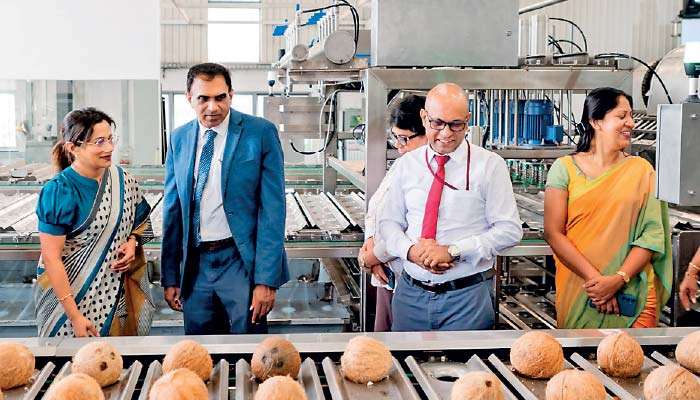 ISF launches world’s first fully automated coconut de-watering system