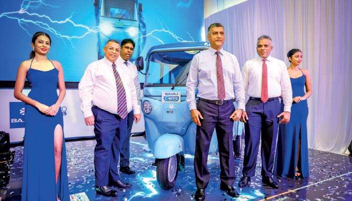 DPMC unveils Bajaj electric three-wheeler