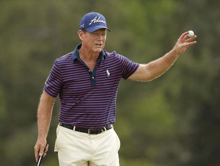 Tom Watson of the U.S. waves after finishing the 18th hole during second round play of the Masters golf tournament at the Augusta National Golf Course in Augusta