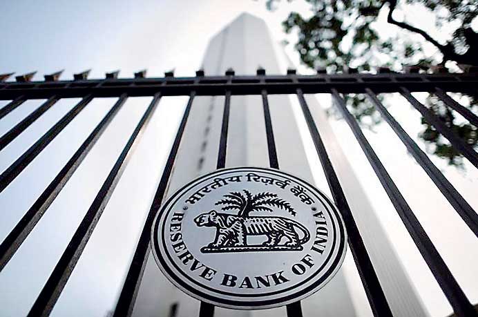 The Reserve Bank of India seal is pictured on a gate outside the RBI headquarters in Mumbai