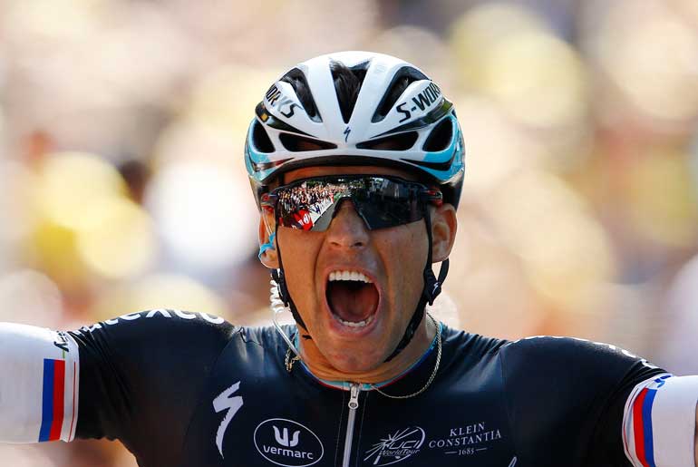 Etixx-Quick Step rider Stybar of the Czech Republic celebrates as he crosses the finish line to win the 6th stage of the 102nd Tour de France cycling race from Abbeville to Le Havre