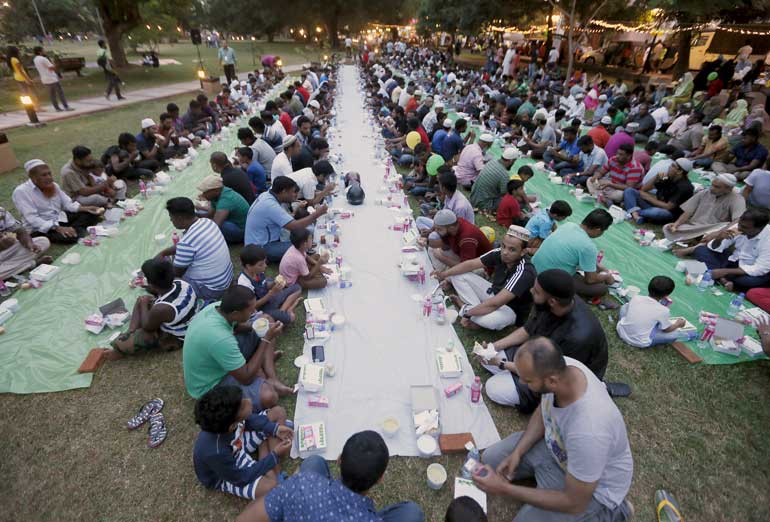 Sri Lankan Muslims break their fast at the end of the day during the holy month of Ramadan in Colombo