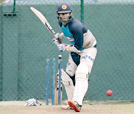 Sri Lanka's cricket captain Mathews plays a shot during a practice session ahead of their third and final test cricket match against India in Colombo