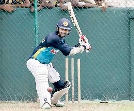 Sri Lanka's Tharanga plays a shot during a practice session ahead of their third and final test cricket match against India in Colombo