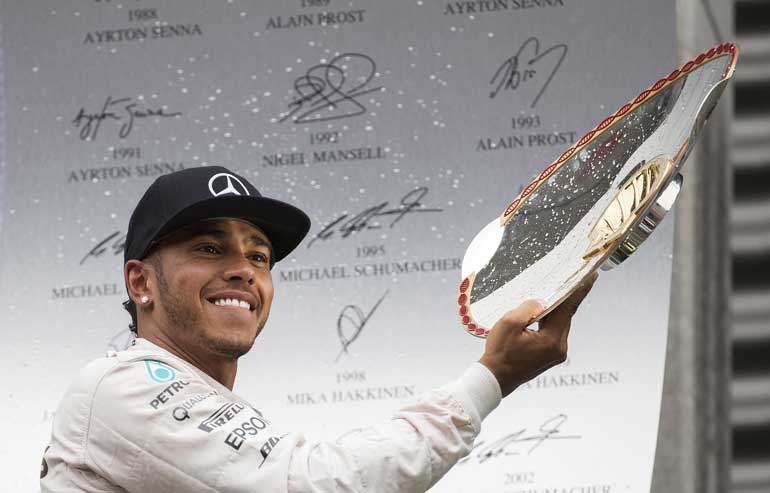 Mercedes Formula One driver Lewis Hamilton of Britain  celebrates his victory in the Belgian F1 Grand Prix in Spa-Francorchamps