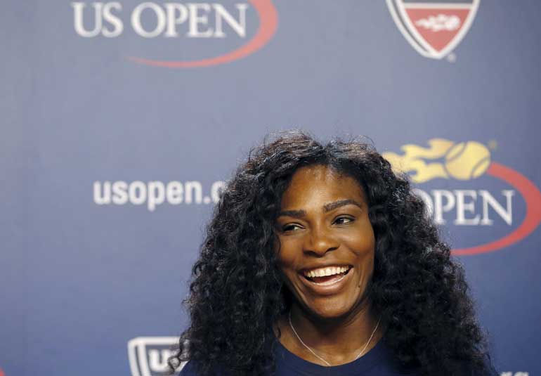 Serena Williams of the U.S. speaks during a news conference at the USTA Billie Jean King National Tennis Center ahead of the 2015 U.S. Open tennis tournament in New York