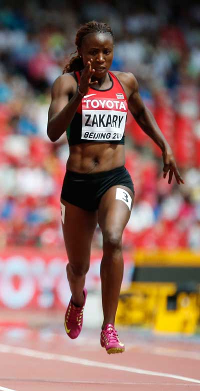 Zakary competes in her women's 400 metres heat at the 15th IAAF World Championships at the National Stadium in Beijing