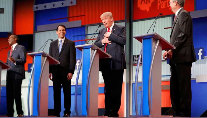 Republican 2016 U.S. presidential candidate and businessman Donald Trump reacts near the end of the first official Republican presidential candidates debate of the 2016 U.S. presidential campaign in Cleveland