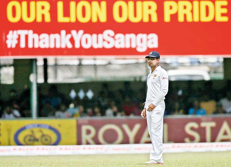 Sri Lanka's Sangakkara looks on during the fourth day of their second test cricket match against India in Colombo