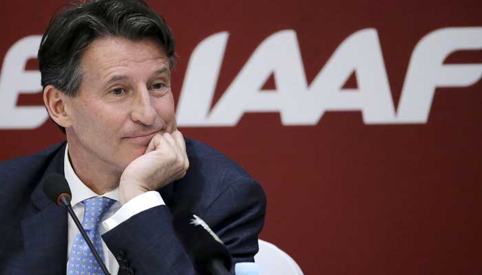 Newly elected President of International Association of Athletics Federations Coe listens to a question at a news conference in Beijing