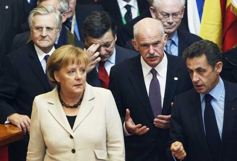 File photo of Germany's Chancellor Merkel, Greece's PM Papandreou and France's President Sarkozy at an informal summit of EU heads of state and government in Brussels