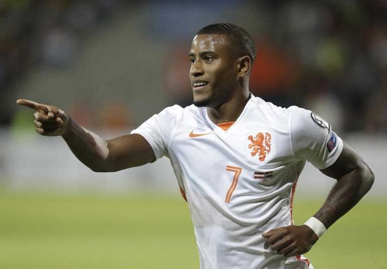 Netherlands' Narsingh celebrates his goal against Latvia during a soccer Euro 2016 qualification match in Skonto stadium in Riga