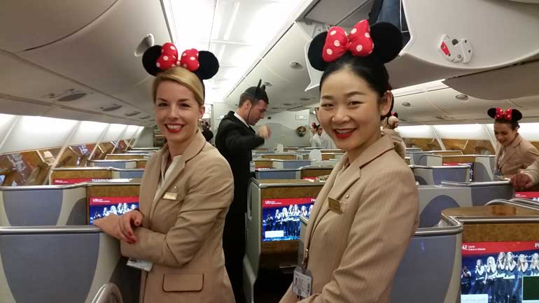 3-Emirates-staff-in-inaugural-flight-dressed-to-welcome-passengers-onboard-to-home-of-Disney-World-