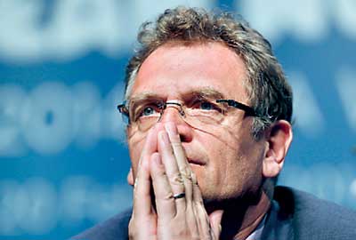 File photo of FIFA General Secretary Valcke listening to a question during an announcement on the status of Curitiba as a host city for the 2014 World Cup, in Florianopolis