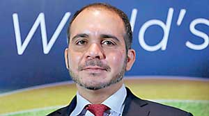 Jordan's Prince Ali Bin Al-Hussein, FIFA's Asian vice president and chairman of the Jordan Football Association, poses for photographers after a news conference in central London