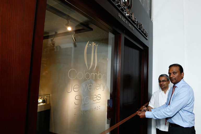 Softlogic-Holdings-Chairman-Ashok-Pathirage-opens-the-new-look-CJS-Store-at-ODEL-as-CJS-Chairman-Akram-Cassim-looks-on