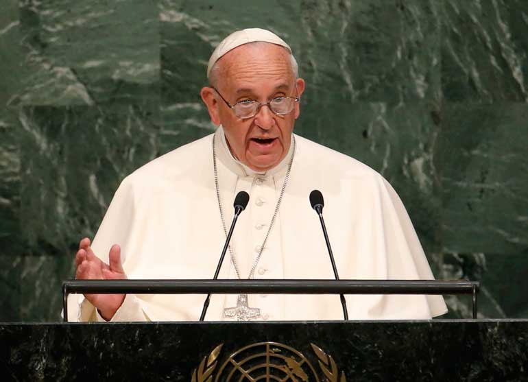 Pope Francis addresses a plenary meeting of the United Nations Sustainable Development Summit 2015 at United Nations headquarters in Manhattan