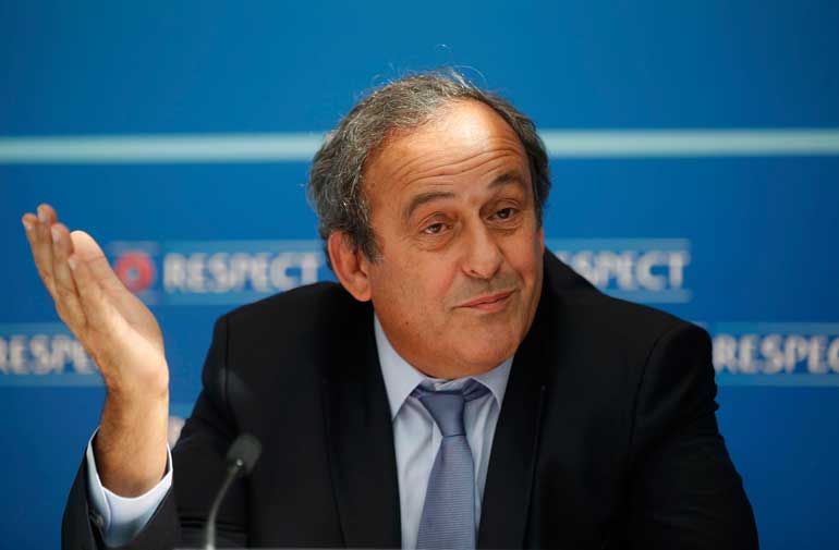 UEFA President Platini attends a news conference after the draw for the 2015/2016 UEFA Europa League soccer competition at Monaco's Grimaldi Forum in Monte Carlo