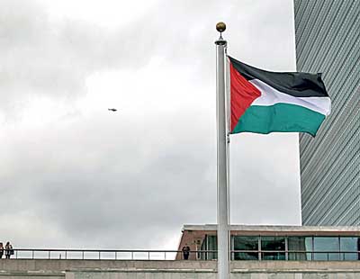The Palestinian flag flies after being raised by Palestinian President Mahmoud Abbas in a ceremony outside the United Nations during the 70th session of the U. N. General Assembly in New York