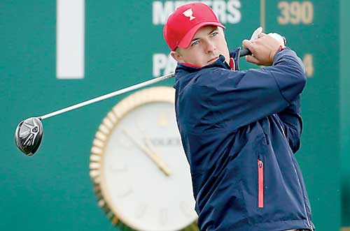 U.S. team member Spieth tees off on the first hole during their singles matches of the 2015 Presidents Cup golf tournament at the Jack Nicklaus Golf Club in Incheon