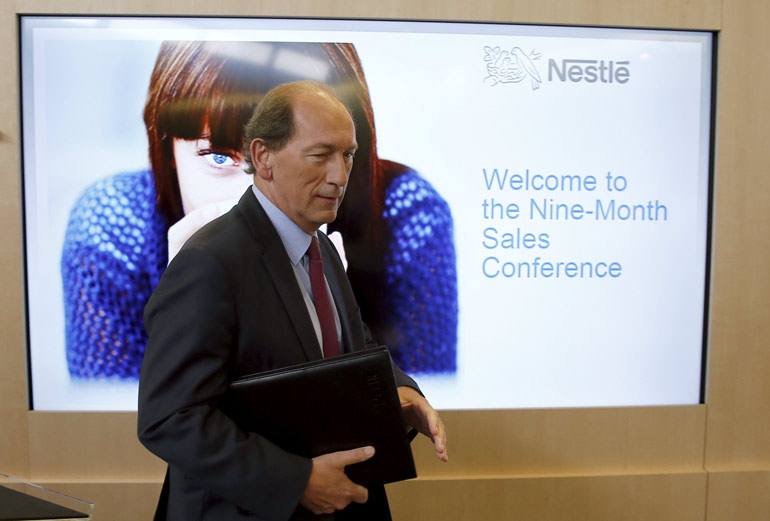 Nestle Chief Executive Paul Bulcke arrives for a news conference at the company headquarters in Vevey