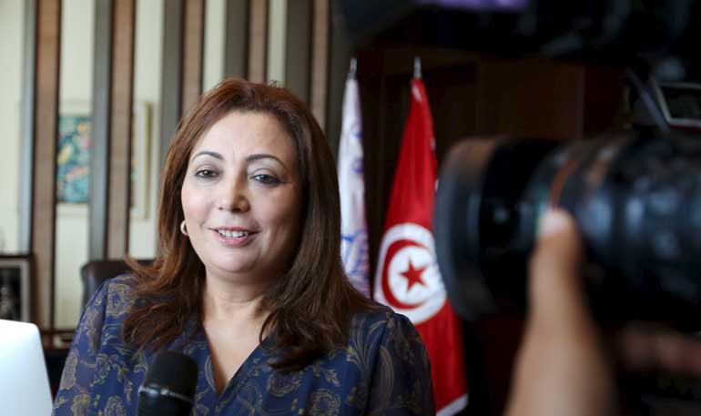 Wided Bouchamaoui talks to journalists in her office in Tunis