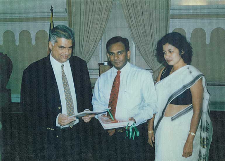 Presenting-the-first-Noel-magazine-to-then-PM-Ranil-Wickremesinghe