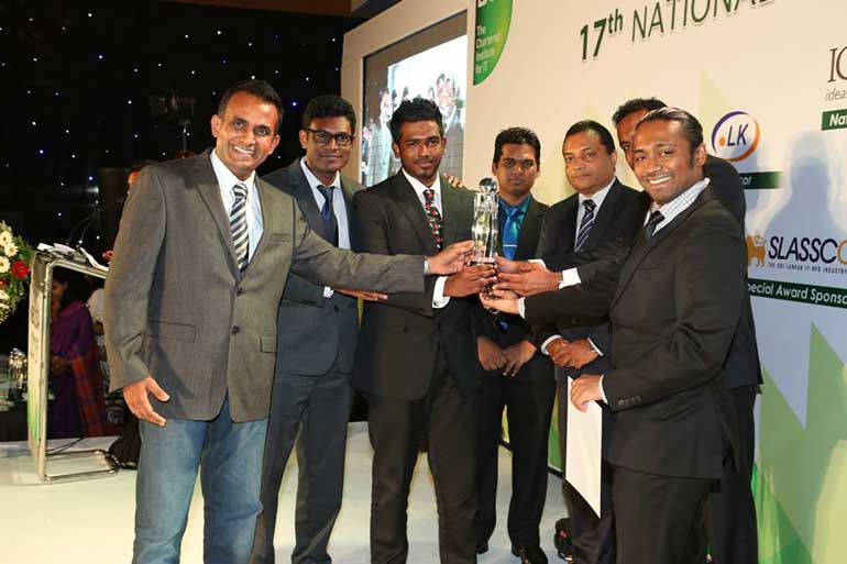 The-Axienta-team-collecting-their-award-at-NBQSA