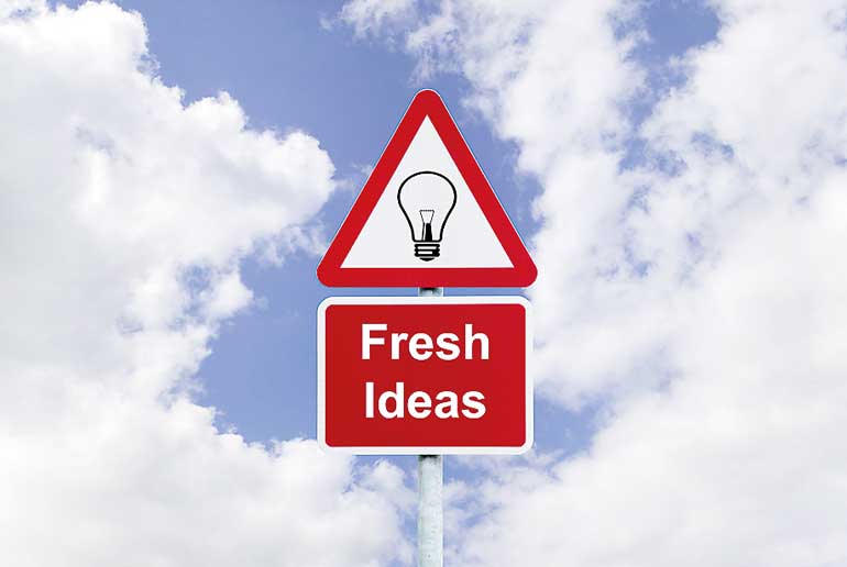 Fresh ideas signpost in the sky