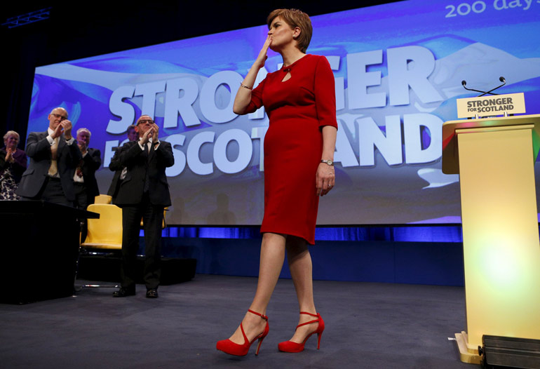Scotland's First Minister and leader of the Scottish National Party (SNP) Nicola Sturgeon acknowledges delegates at the party's annual conference in Aberdeen, Scotland