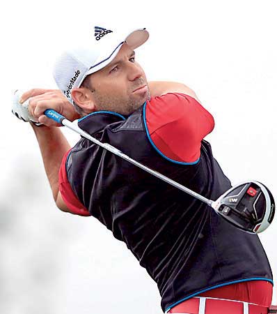 Sergio Garcia of Spain tees off on the 15th hole during the first round of the BMW Masters 2015 golf tournament at Lake Malaren Golf Club in Shanghai