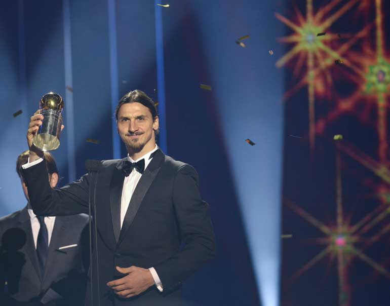 Swedish striker Zlatan Ibrahimovic poses with the Golden Ball award at the annual soccer gala in Stockholm