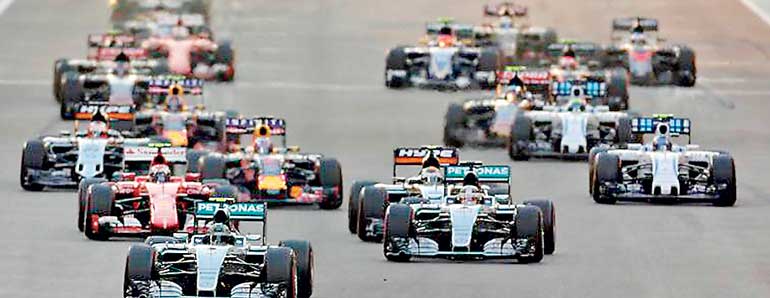 Mercedes Formula One driver Nico Rosberg of Germany leads the pack during the Abu Dhabi F1 Grand Prix at the Yas Marina circuit in Abu Dhabi