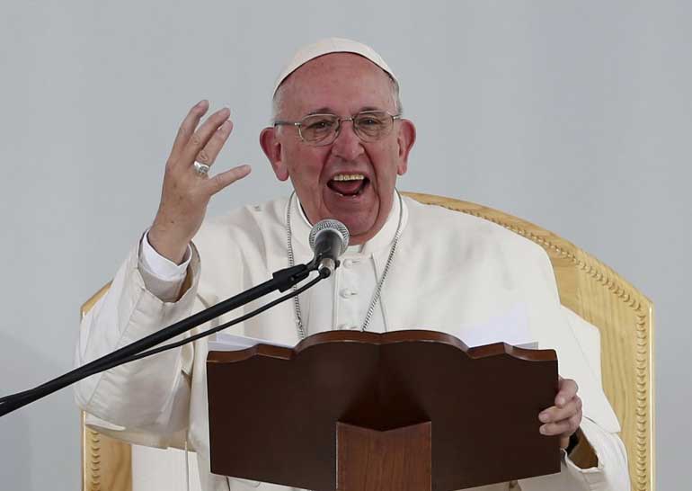 Pope Francis addresses the audience during a meeting with youths at the Jose Maria Morelos y Pavon stadium in Morelia