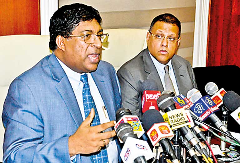 Finance-Minister-Ravi-Karunanayake-address-the-press-conference-and-Central-Bank-SL-Governor-Arjuna-Mahendran-(2)