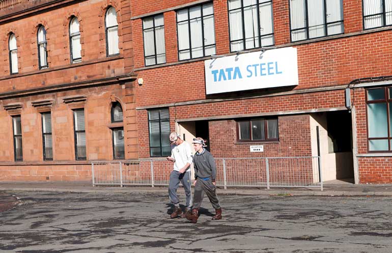File photo of workers leaving the Tata Steel plant in Motherwell
