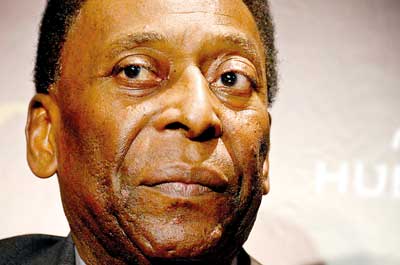 Pele looks on during a news conference  in Rio de Janeiro