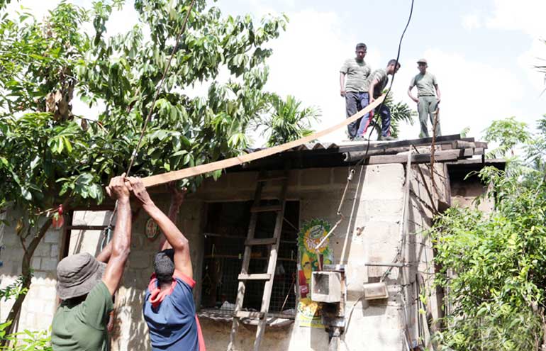 Outside-lead-2-Reconstruction_of_houses_in_Kosgama_progressing_steadily_20160614_03p2