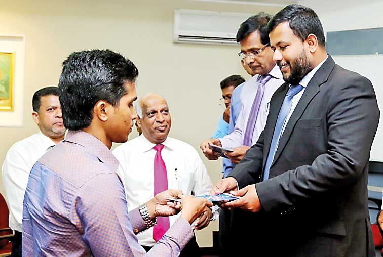 industry-and-commercer-minister-rishad-bathiudeen-with-a-batch-member