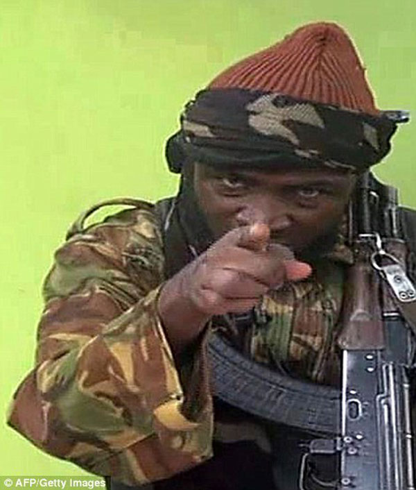 1DC5698200000578-2910580-Master_of_disguise_Boko_Haram_leader_Abubakar_Shekau_points_at_t-m-9_1421325439083