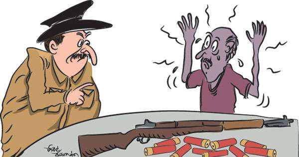 උණ්ඩ-ගිනි අවි සමඟ විශ්‍රාමික ඉඩම් රෙජිස්ට්‍රාර් අත්අඩංගුවට