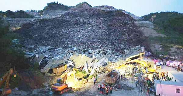 පිලිපීනයේ බිනාලිව් කුණු කන්දට 50ක් යටවේ:12 බේරා ගනිති